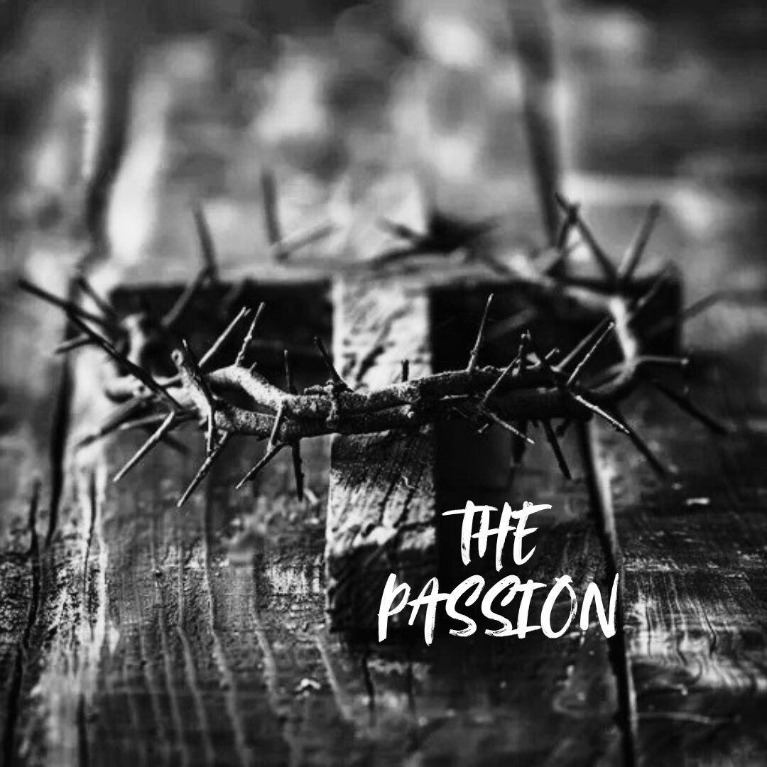 A crown of thorns on a wooden surface with 'The Passion' text.