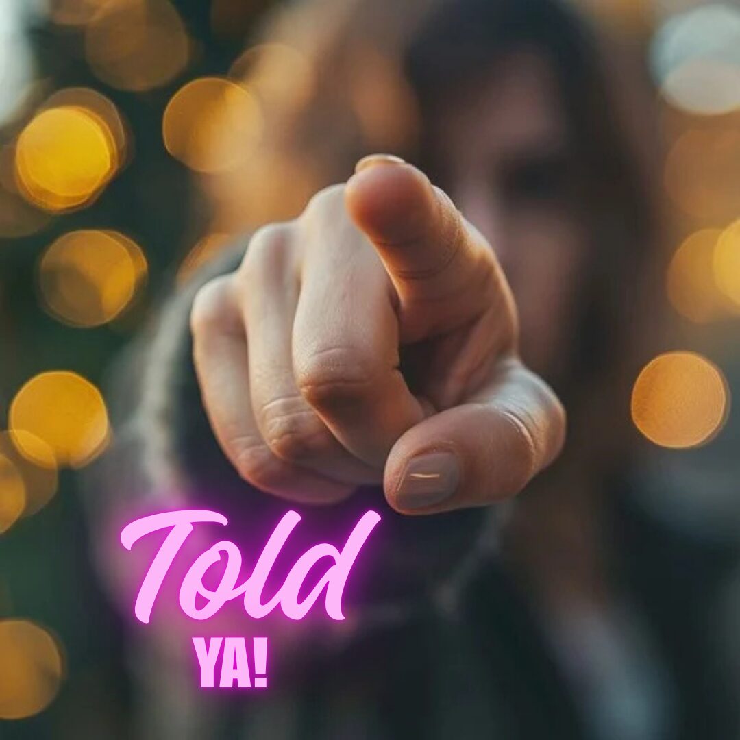 Pointing finger in foreground with bokeh lights